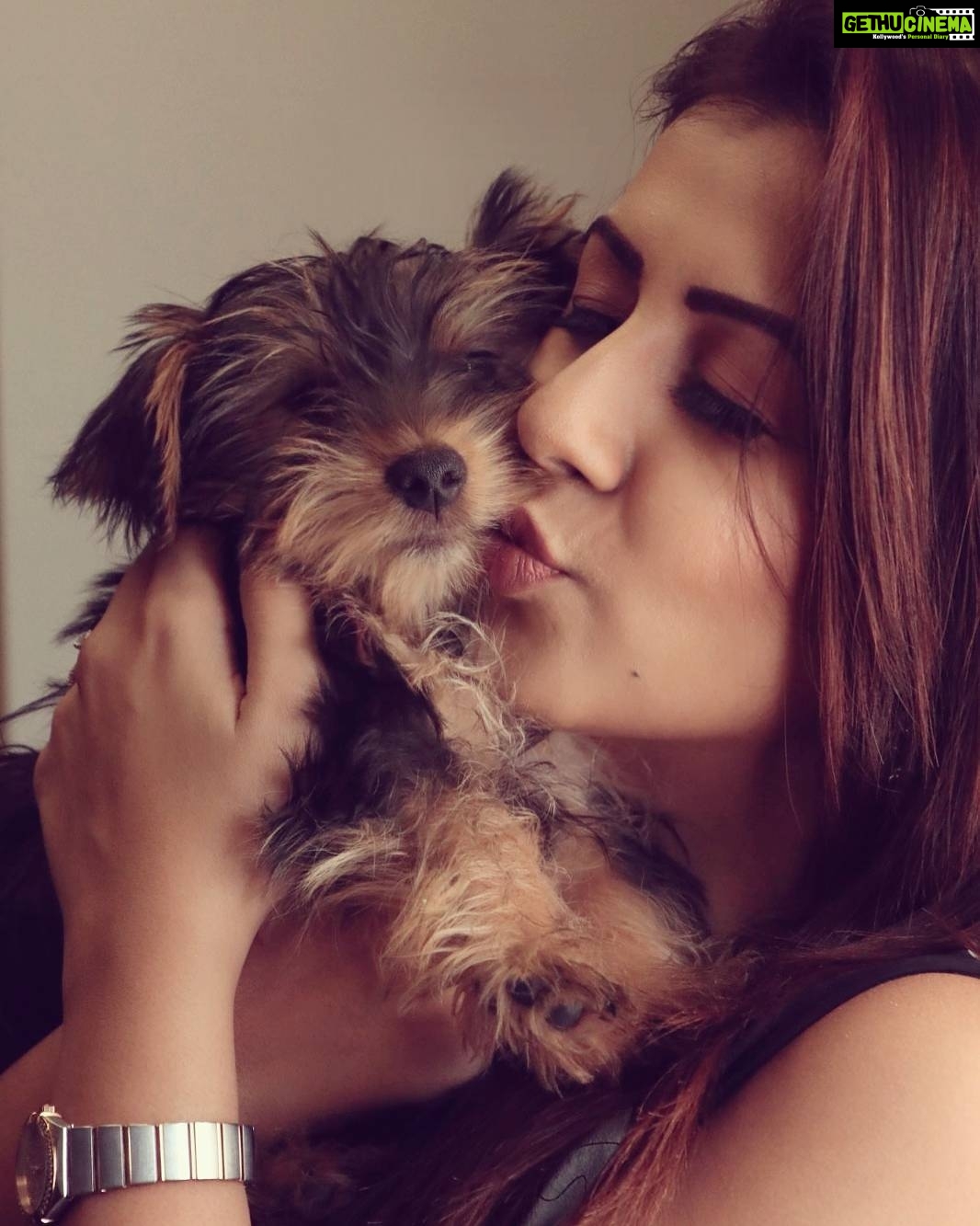 Nikki Galrani Instagram - The truest of all forms of Love 🤗❤ #PuppyLove #DogLove #TeaCupYorkie #KingKong #DogLover