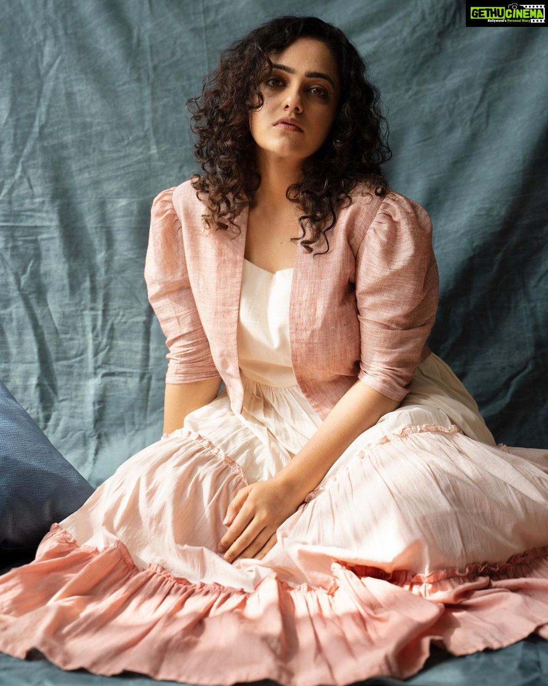 Nithya Menen Instagram - 2022 ✨comes.. with promises 🍃 Outfit - @studiobustle Earrings - @thetrinkaholic Stylist - @sandhya__sabbavarapu Styling team - @rashmi_angara @thumu_bhavana @mythri_g Photography - @shreyaksingh