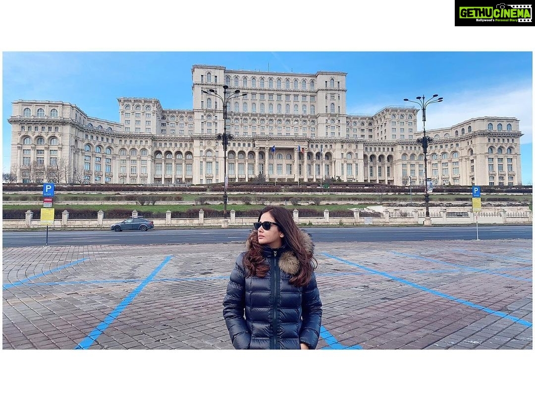 Parul Yadav Instagram - The execution of Nicholas Ceausescu on Christmas day 1989 set in motion events that changed the world. Nothing much remains of Ceausescu's reign but this massive building once meant to symbolise the erasure of Romanian heritage through systemisation. Valued at over €4B this is the most expensive administrative building in the world with maintenance costs exceeding €5M annually. #PYStyleFile #Romania #Bukarest #NicholasCeausescu #Bucharest #TravelRomania #VisitBucharest #PalatulParlamentului #Travel #TravelEurope #Explore #BeautifulDestinations #PalaceOfTheParliament #SandalwoodQueen #KannadaActress #SandalwoodHeroine #Kannadiga #MondayMood #MondayPost #RomanianArt Palatul Parlamentului, Bucuresti