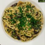 Parvathy Omanakuttan Instagram - Since a lot of you asked me to share the recipe for this one, here it goes… Hearts of Palm pasta with Mushroom and zucchini in Vegan Parmesan sauce Ingredients: 1. @palmini_official Linguine (You can use regular spaghetti as well) 2. Shiitake mushrooms (I used the dried one. You can use button mushrooms if shiitake flavour is too intense for you) 3. Zucchini grated and excess moisture removed 4. Chopped Garlic 5. @goodplanetfoods Vegan Parmesan 6. @goodplanetfoods Vegan Mozzarella 7. Oregano 8. Crushed Pepper 9. Pink salt 10. Chilli flakes 11. Fresh parsley finely chopped Method: 1. Open the packet of palmini and drain the liquid. Wash under tepid water and strain out the water and let it sit until the sauce is ready. 2. In a deep pan add garlic and chopped mushrooms. The flame should be on medium. Sprinkle some water and close with a lid reduce the flames and let the moisture from the mushrooms seep out. This helps in cooking the garlic and mushrooms and infuse the flavours. 3. Once the garlic is slightly browned and mushrooms semi cooked, add the grated zucchini and stir. 4. Add the herbs and spices except* salt* and mix well. Cover with a lid to let the spices do it’s magic 🪄 5. Add the palmini linguine to the sauce (if using regular pass ensure it’s cooked Al Dante or to your liking before you add it to the mixture.) Stir well. 6. Reduce the flame add the vegan Parmesan and Mozzarella. Mix well and cover the pan with the lid for the cheese to melt and combine. {If using regular pasta and you feel it’s soaking up moisture too fast, keep a bit of the pasta water or hot water ready on the side to add to the pan after the cheese} 7. Taste and only then add salt to your liking. Usually Parmesan has salt added especially if using the original Parmigiano Reggiano so DO NOT add salt in the beginning. 8. Chop some fresh parsley. 9. Serve the pasta in a serving dish, garnish with parsley and Voila! Bon Apetito! Do try this recipe and let me know how you liked it. ❤ 𝙃𝙊𝙈𝙀