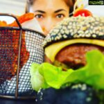 Parvathy Omanakuttan Instagram - Best Vegan Charcoal Burger 🍔 In Dubai 🥰 @sarabeths.uae The softest charcoal bread, juiciest patty, melting cheese, spicy sauce, crunchy veggies and that awesome Sweet potato fries 🤩... you gotta have a big mouth and a real appetite to clean it all up. And I have both 😜 #foodieforlife #dubaichronicles #weekendvibes