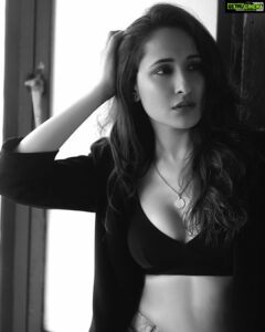 Pragya Jaiswal Instagram - She lost herself a little in that darkness but returned with the stars beneath her skin ✨💫🌟 #bnwmood