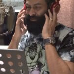 Prithviraj Sukumaran Instagram – When one of the finest Singer/Writer/Director wants you to sing playback for another actor in his film, I suppose you’re entitled to feel just a bit flattered. 🥶 Thank you! @vineeth84 #Hridayam @visakhsubramaniam @heshamabdulwahab