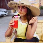 Priya Bhavani Shankar Instagram - MEMORIES 😀Yeaa I buy a new umbrella sized hat get obsessed and I don’t take it off even for dinner 🤷🏻‍♀🕵🏻‍♀ and my jigu jigu radium top with which I lit the street🙈 curiously watching a football match that we lost later that evening 😒🙇🏻‍♀ eat some weird yet yummy stuff and forget the sadness🤗 #memories #spotted #eatdrinksleep