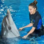 Raai Laxmi Instagram – This is so much fun 🐬#SwimWithTheDolphins🐬 thank u for hosting me with this amazing memorable experience with these cuties 🐬 @dolphinariumdubai ❤️🐬😍