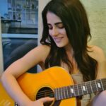 Radhika Madan Instagram - Baby steps. 🎸 What do you think should be my first song?😁