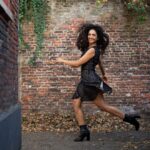 Rukmini Vijayakumar Instagram - It was such a sunny, beautiful day …. 😊 During my choreographic residency …. Photo @sunnyjagesar #thehague #sunny #happy #jumpforjoy #walkingaround #stroll #brickwall