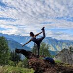 Rukmini Vijayakumar Instagram - Surrender to the inevitable, To the vagaries of the universe, To the unknown, the unpredictable, In that surrender is where one becomes Most powerful, most grand, most free … Photo @iam_shrutha #thoughts #rumination #surrender #himalayas #meditate #giveup #absolve #natarajasana #yogi