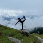 Rukmini Vijayakumar Instagram - Im on the top of the world… looking down on creation… (Old carpenters song) #himalayas #hike #outdoors #tent #adventure #clouds #mountains #yoga