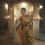 Rukmini Vijayakumar Instagram - Behind the scenes “Namami yoga vidye” . The full version is on YouTube. It’s a lot of work dancing in unsavoury conditions, repeating phrases of movement again and again. I remember the skin on my feet had come off completely because the floor was so rough. The smoke from the lamps had made everyone’s face go black…. But there is a magic to creating on film Will share a few more behind the scenes Video @vivianambrose Music Dr Rajkumar Bharathi @saishravanam @indicayoga @indicasoftpower