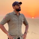 Shanmuga Pandian Instagram - Good to back travelling, desert safari at Dubai Sunny day and sandy feet ! #dubaidays #desertsafari #ootd Red Sand Desert