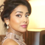 Shriya Saran Instagram – Just like that , another #siima2018 another year. Memories. Thank you @gauravguptaofficial for being part of my journey. Every outfit you make is a story told with fabric. You make poetry with your drapes. Love you to the moon and back. With my giggles, always ….