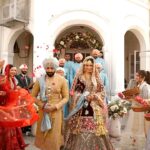 Simran Kaur Mundi Instagram – Time truly flies with you my love @gurickkmaan 🤗❤️
This year has truly been crazy
But, with you it seemed easy-breezy
Lucky i am to call you forever mine
Wiser you may be, but see, even i can rhyme😉 
Ok i tried 🙈
Video by – @thewedding_filmmakers