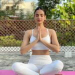 Sonal Chauhan Instagram – Let’s get back to basics Today and just close our eyes, clear our thoughts, breathe and soak in all the positivity that the universe has to offer. And the radiate it all day 🌸🤍🌸
सुखासन / Sukhasana is a foundational posture used for seated meditation in lieu of Lotus Pose. This posture requires hip flexibility and back strength in order to hold the pose for longer periods of time. For those with tight hips and/or those used to sitting in chairs, Easy Pose may require extra practice and warm up. 
* 	Improves posture
* 	Strengthens the back
* 	Improves concentration and focus
* 	Promotes relaxation
📸 @himanichauhan 
.
.
.
.
.
.
.
.
.
.
.
.
.
.
.
.
.
.
.
#love #sonalchauhan #yoga #sukhasana #positivevibes #positivity #smile #radiate #beauty #soakedinshiva #morning #thoughts #easypose #backtobasics #sunday #yogapose #yogamat #yogagirl #fitness #fitgirls