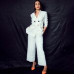 Sonal Chauhan Instagram - Life is too short to blend in !!! 🌸 . . . . . Suit- @sarathelabel HnM- @vijaysharmahairandmakeup Accessories @Mirakinofficial Shoes @luluandskyofficial Styled by @d_devraj 📸- @aviraj #suit #white #love #skyfire #happygirlsaretheprettiest