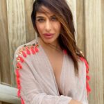 Sophie Choudry Instagram - Worlds change when eyes meet.. Shirt @maisonblu HMU📸 @ambereenyusuf #raw #nofilterneeded #eyes #beauty #sophiechoudry #windswept #naturallight #potd #motd #bare