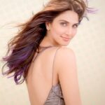 Vaani Kapoor Instagram - I'm always in search of something fresh and new, and I bet you are too. Watch how #StreaxProfessional made my hair pop with their trendiest hair colour collection. Head to your nearest salon and get a custom look with the Hold & Play Funky Colours range and #FeelFunky Tag @streaxprofessional & me in your final looks! I’d love to see them. 💜💙