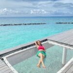 Vedhika Instagram - Bliss is watching the sky from a hammock by the sea @emeraldmaldivesresortspa #emeraldmaldivesresortspa Emerald Maldives Resort & Spa