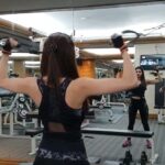 Vedhika Instagram - Life in 2019 B.C (before corona) #Fitness with @mr.santy007 #Biceps #Reels