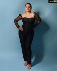 Vidya Balan Instagram - One hour for the calendar to read 2022❤️✨One hour for my birthday 🎈 Outfit - @leaclothingco Shoes - @lynindia.official Makeup - @harshjariwala158 Hair - @bhosleshalaka Styling - @who_wore_what_when Photography- @sohillalani_