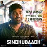 Vijay Sethupathi Instagram - #NenjaUnakaga 2nd Single Video Song from #Sindhubaadh will be released tomorrow An #SuArunkumar Film | A @itsyuvan Musical | Produced by #KProductions - @vansanmovies @clapboardpr @yours_anjali @irfanmalik1983 @kavitha_j1 @mounamravi @onlynikil @muzik247in @ctcmediaboy