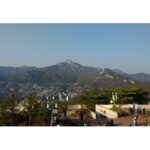 Anaswara Kumar Instagram - "Chasing angels or fleeing demons, go to the mountains." . . . . . . #북악산로 #bugakmountain