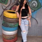 Angana Roy Instagram - Top 'tyre'. 📷@ayan.bhattacharjee_ #casuallook #outfitoftoday #wednesdays #rippedjeans #colorsplash #colorpop #top #croptop #croptee #toptier #colorinspo #tyre #tyre #tower #puns #punstagram #backgroundart #artwork #artstudio #captions #aestheticphotography #portrait_vision #casualshirts #hrx #shoes #unedited #noeditnofilter