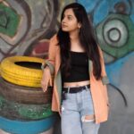 Angana Roy Instagram - Top 'tyre'. 📷@ayan.bhattacharjee_ #casuallook #outfitoftoday #wednesdays #rippedjeans #colorsplash #colorpop #top #croptop #croptee #toptier #colorinspo #tyre #tyre #tower #puns #punstagram #backgroundart #artwork #artstudio #captions #aestheticphotography #portrait_vision #casualshirts #hrx #shoes #unedited #noeditnofilter