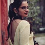 Angana Roy Instagram - Where the streets have no name. 📷@miracle_aligner_ #photooftheday #bestoftheday #yellow #cityofjoy #calcutta #redandyellow #backless #backlesstop #aesthetic #frames #igerskolkata #kolkata_lanes #portraitphotography #redwalls #kolkatastreets #chasmish #wintersun #streetstyle #ponytails #artistofinstagram #tweegrams #instaartsy #nailpolish #streetstylefashion #streetwear #indiapictures #streetphotographyindia #lookingback #earrings #nomakeupmakeuplook