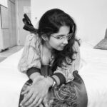Angana Roy Instagram - I've been having dreams Splashin' in a summer stream 📸@ayan.bhattacharjee_ #mondaypost #postoftheday #postoftheweek #trampoline #songlyrics #dreamer #lovefromA #kohleyes #pinkdress #newyeareve #throwback #spectacles #mondaymood #blackboots #ringsandthings #whatif #winteroutfit #winterfashion #endofjanuary #lookbook