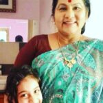 Anju Aravind Instagram – My daughter anvi with her favourite lalithaamma, she still remember the kiss of her fav lalithamma, pranamam laithaamma🙏