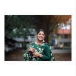 Aparna Balamurali Instagram - Coz you can never go wrong with green! 💚 Pc : @pranavraaaj a person who finds beautiful frames in any place you put him! 💕 Outfit: @crysalzz_mijununizar Accessories: one of my favourite birthday gifts from my girls @malavika.anand @aniee.thomas Kochi, India