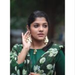 Aparna Balamurali Instagram - Coz you can never go wrong with green! 💚 Pc : @pranavraaaj a person who finds beautiful frames in any place you put him! 💕 Outfit: @crysalzz_mijununizar Accessories: one of my favourite birthday gifts from my girls @malavika.anand @aniee.thomas Kochi, India