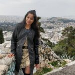 Aparnaa Bajpai Instagram - Goofball🤓 Woke up early morning to walk to the highest point of Athens. A small beautiful church at Mount lycabettus hills. Sleepy face, swollen eyes and a Stunning view. All worth it!! Right behind me you can see the Acropolis. PS: this is that one and only picture you get when you ask strangers to click for you🤣 Also I know my dress is too glittery for day but who cares😎 It's #katharideftera today and I am going to celebrate if I am in Greece. #travelstories #travel #style #Athens #greece #mountlycabettus #lycabettus #glocalchild #goglocal🌍 Mount Lycabettus
