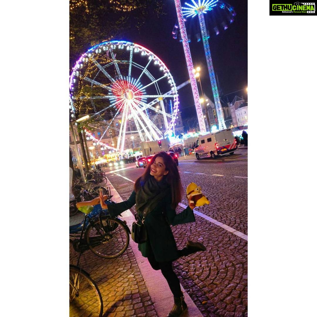 Aparnaa Bajpai Instagram - Minion and I are planning to wander around the streets, eat waffles and cakes and have a lot fun together. Bye😎 Dam Square, Amsterdam