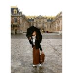 Aparnaa Bajpai Instagram – Waiting for the drizzle to fizzle🌬️☔
#itstartedpouringheavily Versailles, France