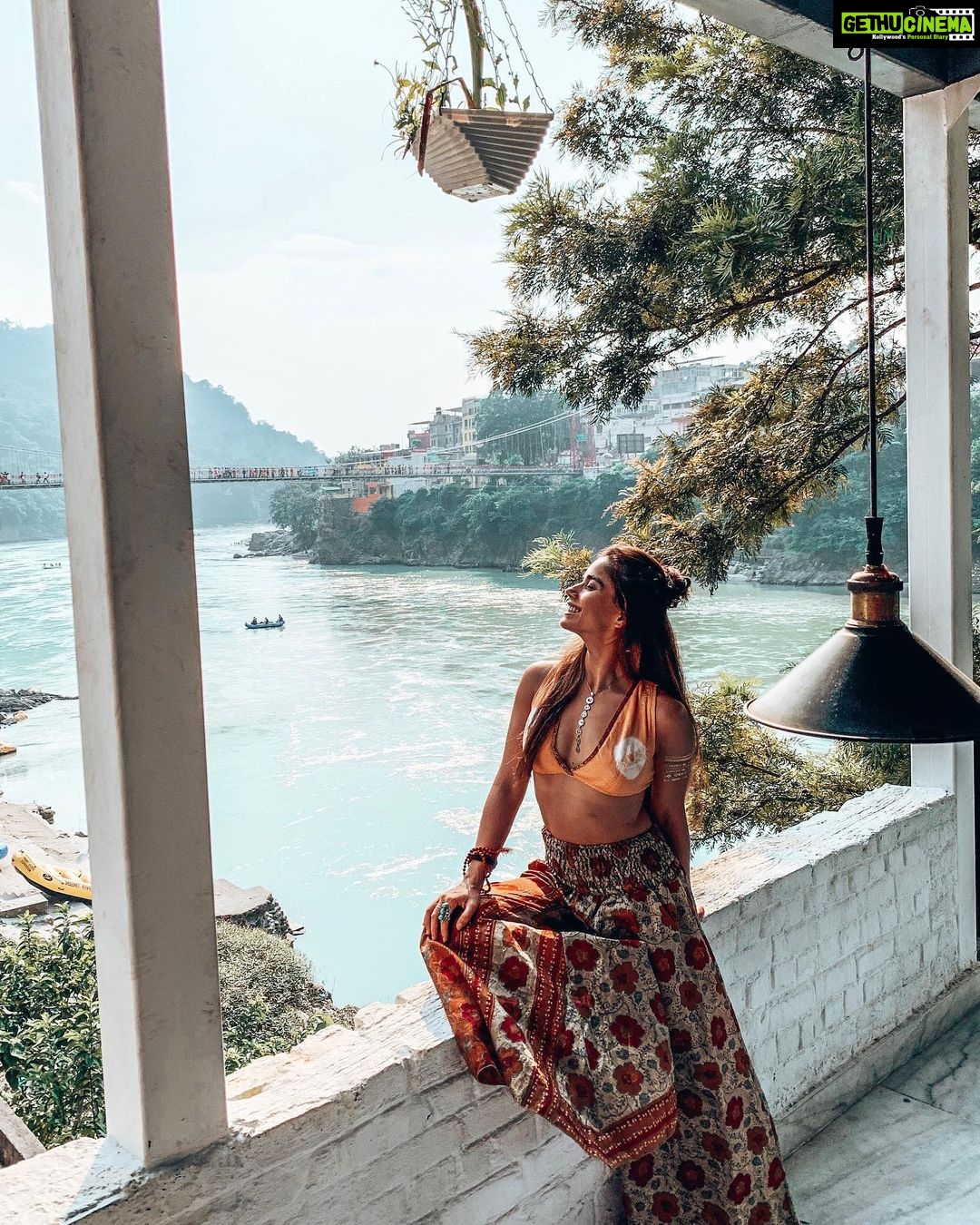 Aparnaa Bajpai Instagram - Let the waves of water drift you slowly into the hidden knowledge and heal you part by part. :-#wordsbyaparnaa Laxman Jula, Rishikesh, Uttrakhand