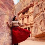 Aparnaa Bajpai Instagram - Standing elegantly behind me is Al-kazneh, known as Petra’s treasury. Some say it served as a museum of the Nabatean era and some believe it was a treasury hiding all the golds and loots. The many theories and legends surrounding this place is extremely intriguing and what makes it one of the seven wonders. What’s worth noticing is how beautifully and intricately these structures are just carved out of mere stone rocks. I can only say one thing, you can not help but get awestruck when you visit this city of mysteries. . . . #petra #petrajordan #treasury #jordan #travel #travelphotography #travelblogger #travelvlog #travelbucketlist #travelshot The Treasury