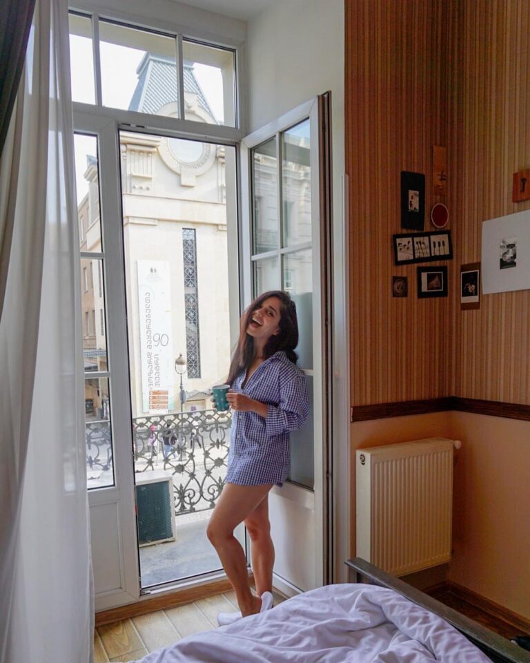 Aparnaa Bajpai Instagram - Life is good when you wake up in beautiful city in a cozy comfy bed to a cup of coffee with a photographer at hand😍 PS: who needs clothes when you have Bae’s🐒 #travel #georgia #tbilisi