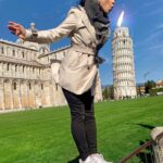 Aparnaa Bajpai Instagram - The wind and I are always in sync. It’s never a wrong time to blow off one more candle cuz as they say, age is just a number. Celebrating Italian style💃 . . . #leaningtowerofpisa #pisa #tuscany #italy #travelvlog #travelphotography #travelbucketlist #travelblogger #travel #traveller Leaning Tower of Pisa