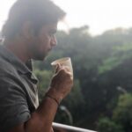 Arjun Sarja Instagram – Enjoying a rainy day with a hot cup of coffee. Good Morning Sweetzz