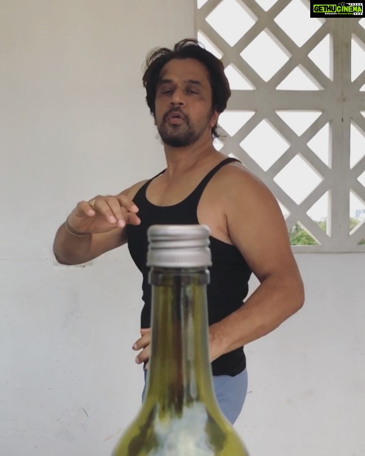 Arjun Sarja Instagram - Dedicated to my Boss Bruce and all my fans #bottlecapchallenge