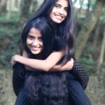 Arthana Binu Instagram - Piggy back rides are kind of a part of our daily routine now 😁 . . . . #nationalsistersday