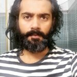 Ashwin Kakumanu Instagram - Decided to give myself some tinkering and polishing today.got fed up of looking like a caveman. Instead of getting food stuck in my beard I can feel the wind. And wife and daughter are thankful as well. :) If anyone's casting for an 70s or 80s period film let me know. I've got the look. #wannaberambo #billandtedlook #anniyan remo #lockdownparithabangal #ponniyinselvan