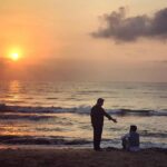 Ashwin Kakumanu Instagram - Shooting the sunrise. Sometimes all you need is a helping hand. #sunrise #beach #silhouette thanks for the photo @preetisingla