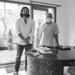 Ashwin Kakumanu Instagram - A special moment for me in my career. Got to take this photo with Mr. Mani Ratnam after I finished dubbing for my portions in #PonniyinSelvan. From meeting him in his office 12 years ago to auditioning multiple times for different projects to being selected and working on this film, it's been a ride. 🔥 * * * P.S: That's my copy of @baradwajrangan book on his table that I took to get autographed. #ponniyinselvan #Manisir #Madrastalkies