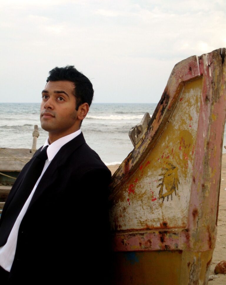 Ashwin Kakumanu Instagram - Clean up good. My first portfolio from 2008. Rockin 'The Rock' sideburns that I used to love so much. Shot by my partner in crime and time @sonalimanavalan #lifesabeach #portfolio #actor