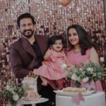 Bhama Instagram - Gauri’s 1st Birthday ♥️ @party.genie Pink attire @t.and.msignature @meralda.jewels @shibin4865 @shabeerzyed_photography @2b1_films Arun’s attire @men_in_q_wedding