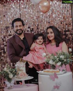 Bhama Instagram - Gauri’s 1st Birthday ♥️

@party.genie 
Pink attire @t.and.msignature 
@meralda.jewels 
@shibin4865 
@shabeerzyed_photography 
@2b1_films 
Arun’s attire @men_in_q_wedding