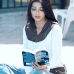 Bhumika Chawla Instagram - This photo was taken years ago in Canada , during the shoot of my Punjabi film Yaariyan with Director Deepak Grewal and co starring Gurda Mann Sir Those were the days i was a voracious reader .. i read now though take a while to finish books .. Memories